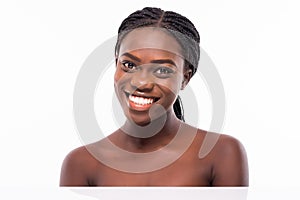 Beauty African Woman face Portrait. Beautiful Spa model Girl with Perfect Fresh Clean Skin. Brunette female looking at camera and