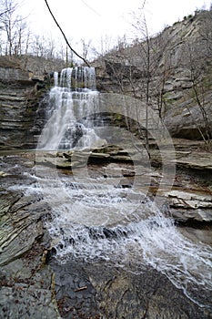 beauty of Alferello waterfall enveloped in the warm and embracing tones of autumn