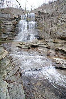 beauty of Alferello waterfall enveloped in the warm and embracing tones of autumn