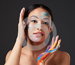 Beauty, art and face paint, portrait of woman with creative makeup and self expression. Skincare, creativity and color