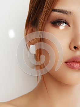Beauty asian girl with creative make-up. Portrait of young beautiful asian girl with smoky eye makeup