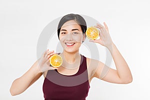 Beauty asian japanese woman hold Oranges.Beauty concept. Beautiful Joyful teen girl with freckles, funny red hairstyle and yellow