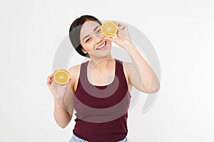 Beauty asian japanese woman hold Oranges.Beauty concept. Beautiful Joyful teen girl with freckles, funny red hairstyle and yellow