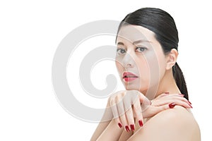 Beauty asian red lipstick woman nail polish finger on shoulder