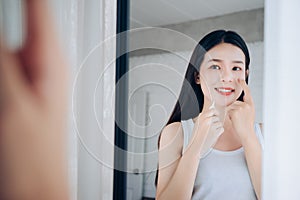 Beauty Asian Woman use Acne Gel Skincare after Cleansing