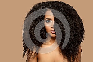 Beauty black skin woman African Ethnic female face. Young african american model with long afro hair. Lux model photo