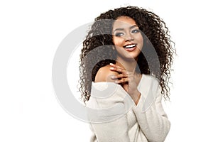 Beauty black skin woman African Ethnic female face. Young african american model with long afro hair.Smiling model isolated on
