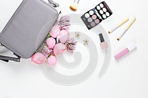 Beauty blog concept flat lay. Fashion accessories, flowers, cosmetics, jewelry, copyspace.