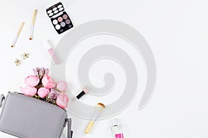 Beauty blog concept flat lay. Fashion accessories, flowers, cosmetics, jewelry, copyspace.