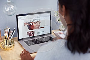 Beauty, blog and girl and back with screen, reading online and cosmetology for elearning. Browse, digital notes with photo