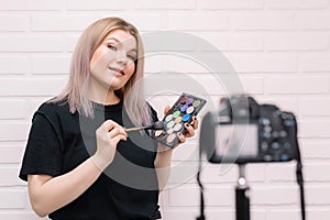 Beauty blogger influencer in front of the camera