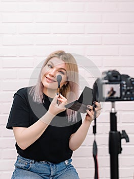 Beauty blogger influencer in front of the camera