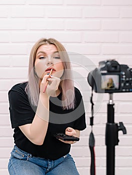 Beauty blogger influencer in front of the camera