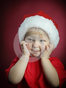 Beauty boy in christmas hat