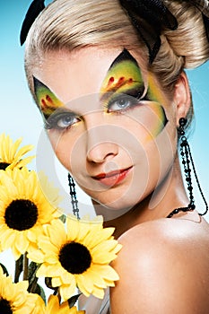 Beauty with butterfly face-art