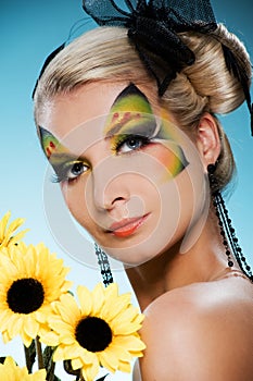 Beauty with butterfly face-art