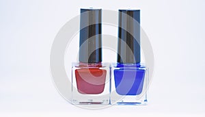 Beauty and care concept. Nail polish bottles different colors. Nail polish white background. Manicure salon. Durability