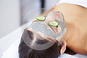 Beauty and Care. Woman in Spa Salon. Young Girl Lying on Massage Tables and Relaxing. Pure Skin and Beautiful Smile