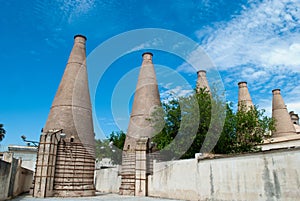 The chimneys of the Cartuja monastery, once the furnaces for the processing of tiles photo