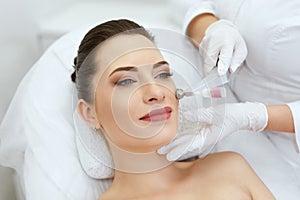 Beauty Clinic. Woman Doing Face Skin Cryo Oxygen Treatment