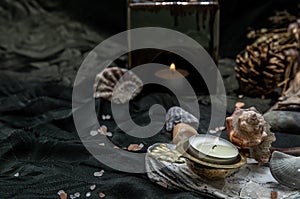 Beauty composition with Burning candle aroma oil lamp on dark background