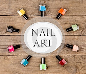 Beauty concept - Bright colorful bottles with gel-varnish for covering nails and text nail art