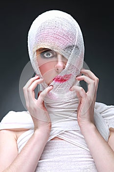 Beauty Concept of Heavy Makeup Seeping Through Gauze