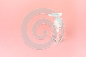 Beauty cosmetics glassbottle; branding mock up; front view on pastel pink background.