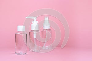 Beauty cosmetics glassbottle; branding mock up; front view on pastel pink background.