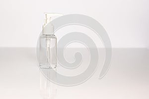 Beauty cosmetics glassbottle; branding mock up; front view on pastel white background.