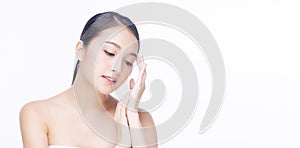 Beauty, cosmetics, healthy, treatment, skincare and spa concept. Asian young woman touching own face with clear fresh skin.