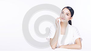 Beauty, cosmetics, healthy, treatment, skincare and spa concept. Asian young woman touching own face with clear fresh skin.