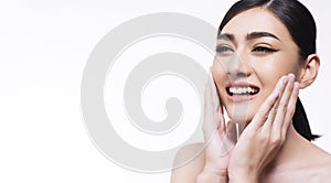 Beauty, cosmetics, healthy, treatment, skincare spa concept. Asian young woman touching own face with clear fresh skin.