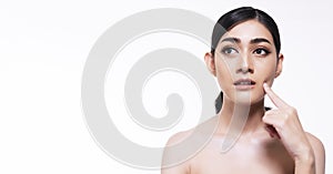 Beauty, cosmetics, healthy, treatment, skincare spa concept. Asian young woman touching own face with clear fresh skin.