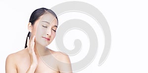 Beauty  cosmetics  healthy  treatment  skincare and spa concept. Asian woman touching own face with clear fresh skin.