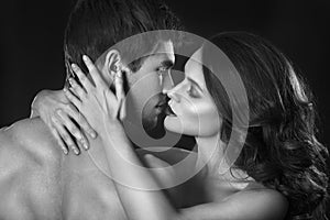 beauty couple.Kissing couple portrait.Sensual brunette woman in underwear with young lover, passionate couple