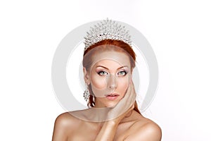 Beauty crowned queen girl woman miss bride hand on cheek