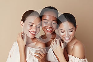 Beauty. Diverse Group Of Ethnic Women Portrait. Happy Different Ethnicity Models Standing Together With Closed Eyes And Smiling.