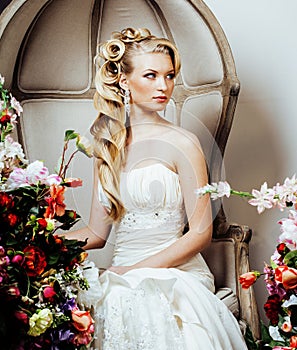 Beauty emotional blond bride in luxury interior dreaming, crazy