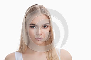 Beauty face of blonde teenager girl isolated on white background