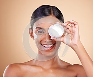 Beauty, face cream and portrait of a woman in studio for skincare, dermatology and cosmetics. Happy Indian female model