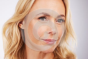 Beauty, face and a mature woman in studio for skincare, cosmetics and anti aging dermatology. Aesthetic model person on