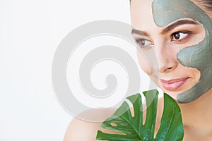 Beauty face skin care. Woman with cosmetic spa facial mask