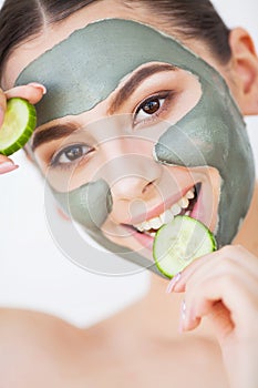 Beauty face skin care. Woman with cosmetic spa facial mask