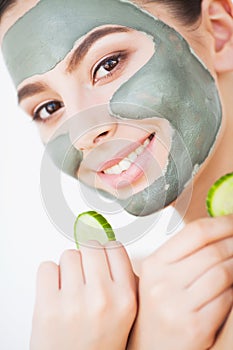 Beauty face skin care. Woman with cosmetic spa facial mask