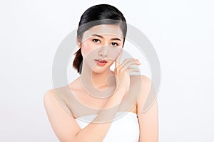 Beauty face. Smiling asian woman touching healthy skin portrait. Beautiful happy girl model with fresh glowing hydrated facial