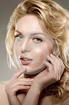 Beauty face woman. Girl healthy model in spa salon. Cream treatment products. Facial skin terapy photo