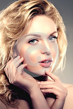 Beauty face woman. Girl healthy model in spa salon. Cream treatment products. Facial skin terapy