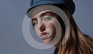 Beauty face of young woman. Sexy model posing in studio. Portrait of beautiful girl. Beauty woman face closeup. Pretty