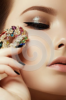 Beauty and fashion concept. Beautiful woman with jewelry